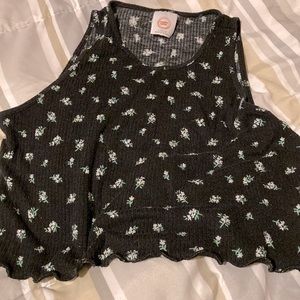 It has white little flowers on it, and is full black.